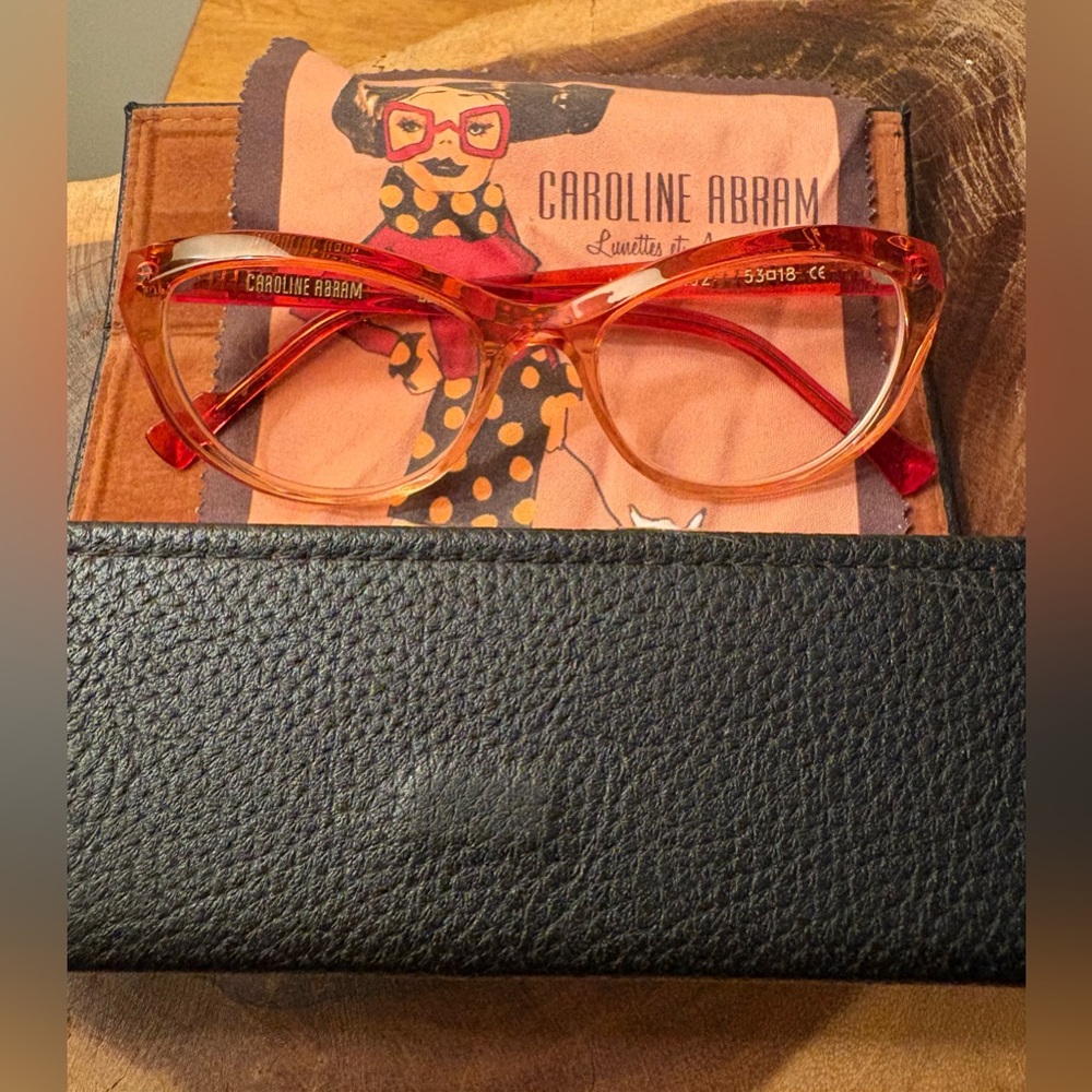 Caroline Abram cat eye translucent red frames